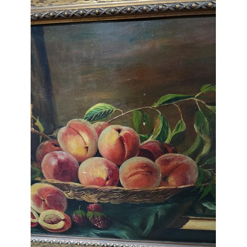 120 - Framed oil on board of a still life scene of peaches in a bowl, in an ornate gilt frame, signed to l... 