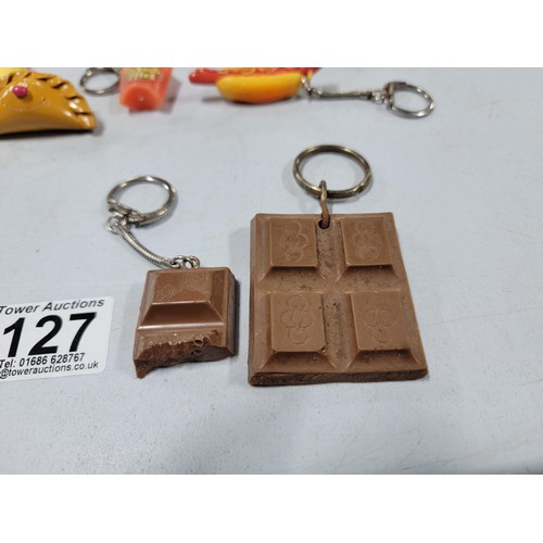 127 - Large collection of fast food related key rings inc burgers, fries, hot dogs, chocolate, ice cream e... 