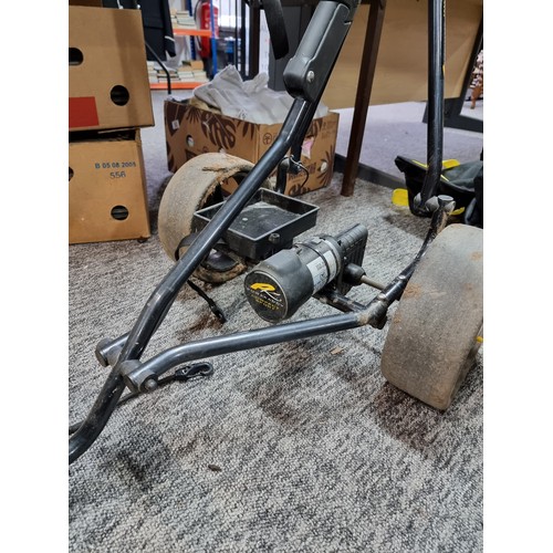 4 - 2x electric golf trolleys by powakaddy for spares or repairs. 1 includes its lithium battery, and ch... 