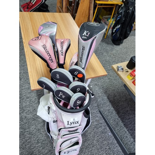 6 - A ladies right handed gold club set, all colour coded pink, to include a Lynx gold bag complete with... 