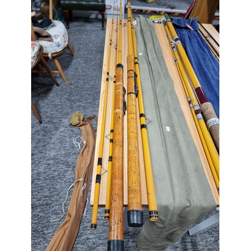 9 - A collection of 3x good fishing rods to include a K five piece combo hollowed glass rods set, a 3 pi... 