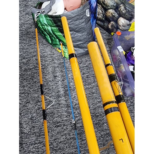 9 - A collection of 3x good fishing rods to include a K five piece combo hollowed glass rods set, a 3 pi... 