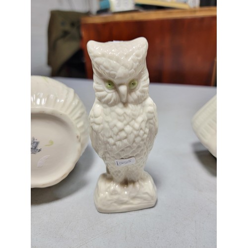 136 - 3x Belleek pieces inc a clock, owl figurine, and vase. Clock requires a new face, largest piece meas... 