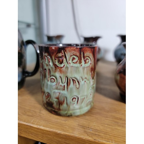 140 - 13x Ewenny Ware studio pottery pieces inc tankards and vases all of different colours inc a royal co... 