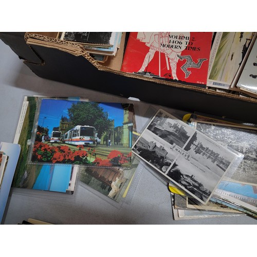 153 - 2x boxes containing a very large collection of postcards from around the world inc Malta, California... 