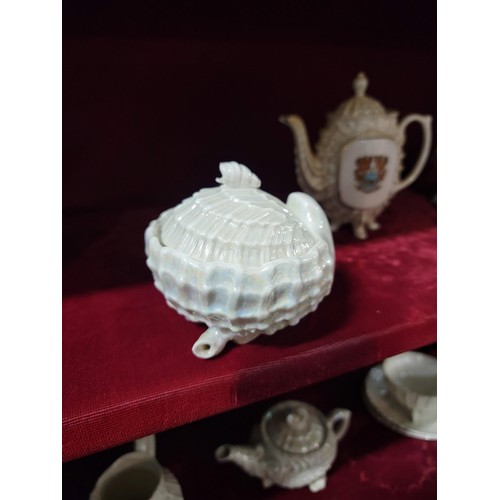 296 - 11x part teaset in a shell and pearlescent design in good order, inc teapot, lidded sugar bowl 2x cu... 