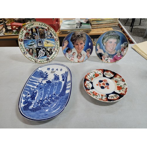 297 - 2x display plates one of Diana, the other celebrating the Millennium along with a hand painted plate... 