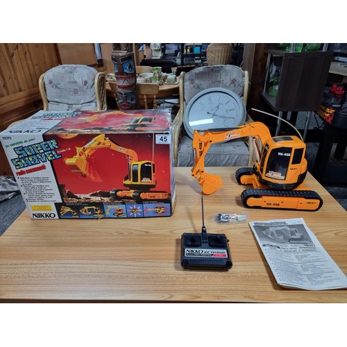 64 - A rare Nikko super shovel remote control excavator from the 1980's, in very clean looked after condi... 