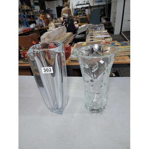 302 - 2 large decorative lead crystal flower vases inc a leaf design, tallest vase stands at 33cm high