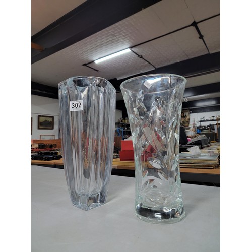 302 - 2 large decorative lead crystal flower vases inc a leaf design, tallest vase stands at 33cm high