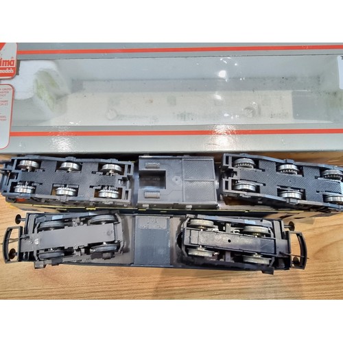 28 - 2x boxed diesel locomotives OO gauge, one which is by Hornby 37113 (Radio Highland) the other by Lim... 