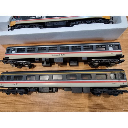 29 - A Lina Italy OO gauge intercity 47613 North Star locomotive, boxed, along with 2 Lima Italy passenge... 