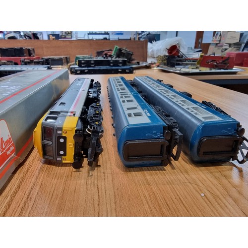 32 - A Hornby OO gauge class 47460 intercity locomotive along with 2 Hornby intercity coaches, all in exc... 