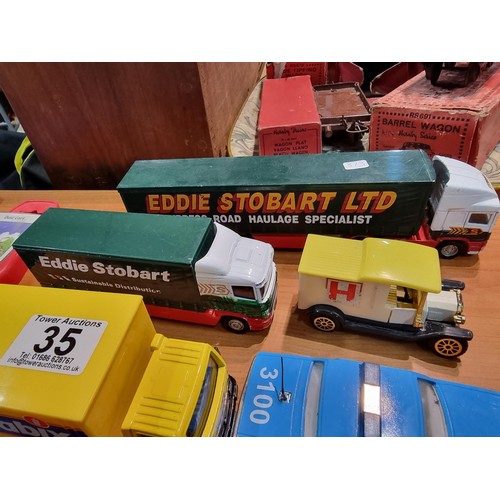 35 - A collection of 15x diecast model vehicles to include 2x Corgi Eddie Stobart lorries, a diecast scoo... 