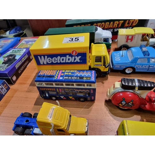 35 - A collection of 15x diecast model vehicles to include 2x Corgi Eddie Stobart lorries, a diecast scoo... 