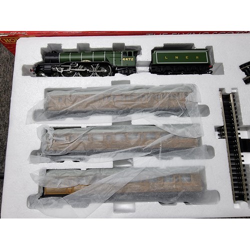 56 - A brand new in box  Hornby R1167 Flying Scotsman 3 coach train set with sealed track mat and reraile... 