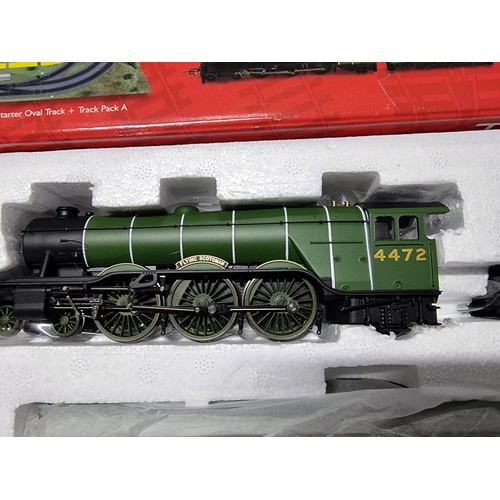 56 - A brand new in box  Hornby R1167 Flying Scotsman 3 coach train set with sealed track mat and reraile... 