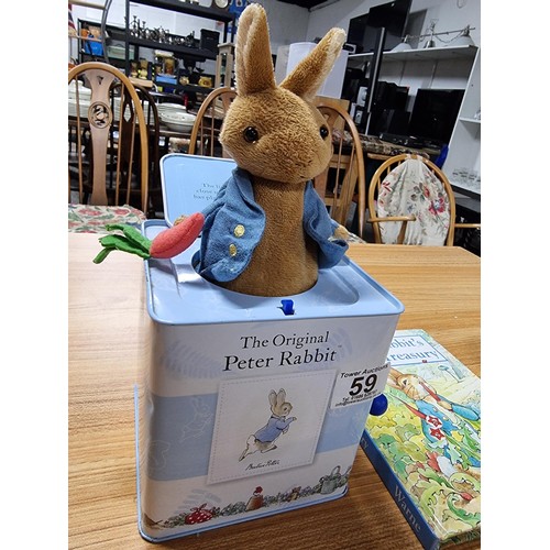 59 - A collection of Peter Rabbit items to include a Peter Rabbit tin Jack in a box by Rainbow designs al... 