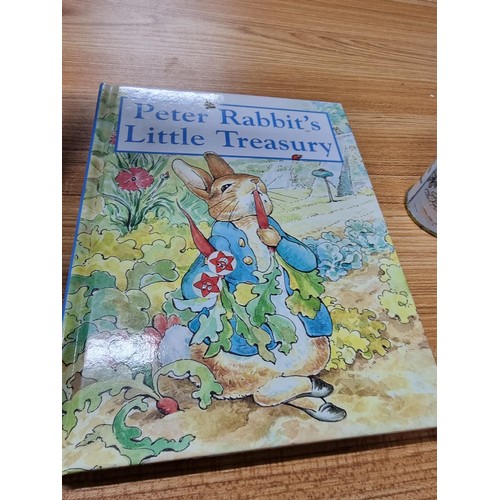 59 - A collection of Peter Rabbit items to include a Peter Rabbit tin Jack in a box by Rainbow designs al... 