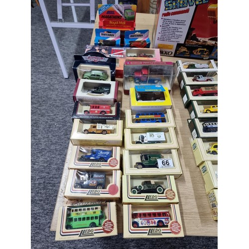 66 - A large collection of 19x as new diecast model vehicles by various makers including Lledo, promoters... 