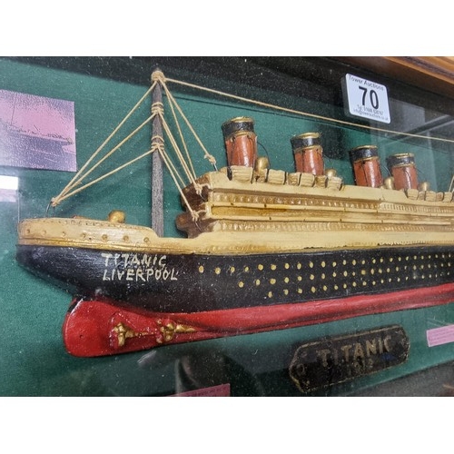 70 - A handmade sculpture diorama of the Titanic featuring a well made handmade model along with ephemera... 