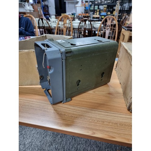 76 - A military 12v rotary power supply unit by Pye complete with its original box.