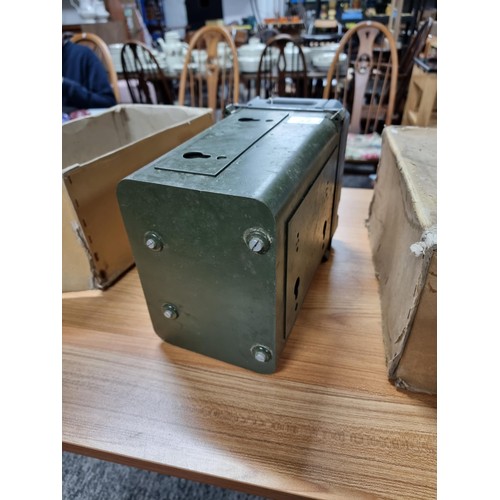 76 - A military 12v rotary power supply unit by Pye complete with its original box.