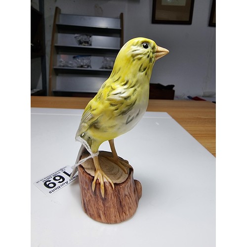 169 - A Goebel West Germany hand painted porcelain bird figure of a canary. In excellent clean condition w... 