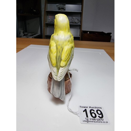 169 - A Goebel West Germany hand painted porcelain bird figure of a canary. In excellent clean condition w... 