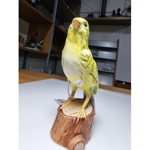 169 - A Goebel West Germany hand painted porcelain bird figure of a canary. In excellent clean condition w... 