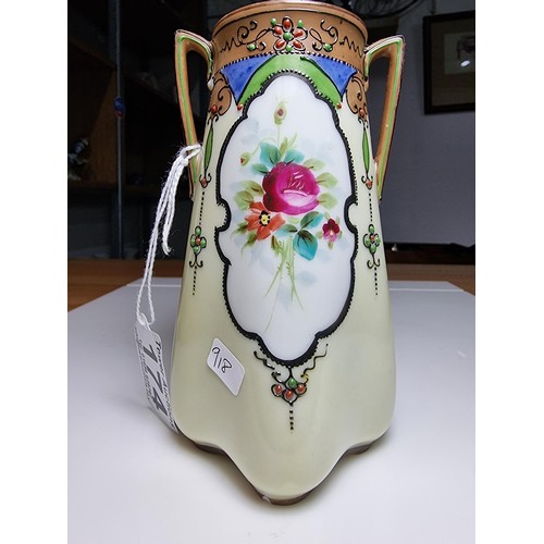 174 - A very pretty quality hand painted twin handled vase by Noritake Japan featuring a hand painted flor... 