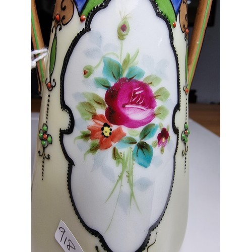 174 - A very pretty quality hand painted twin handled vase by Noritake Japan featuring a hand painted flor... 