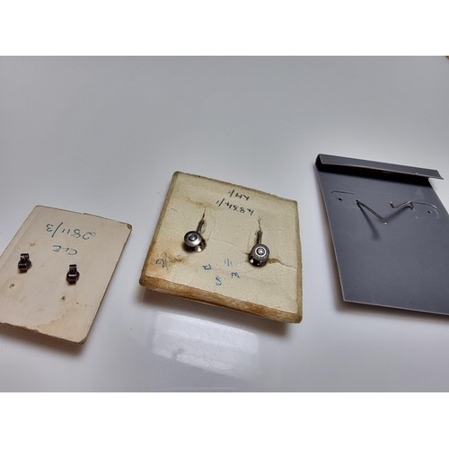 182 - A bundle of 3 pairs of 925 silver earrings and a gold plated opal pendant and chain to include an op... 