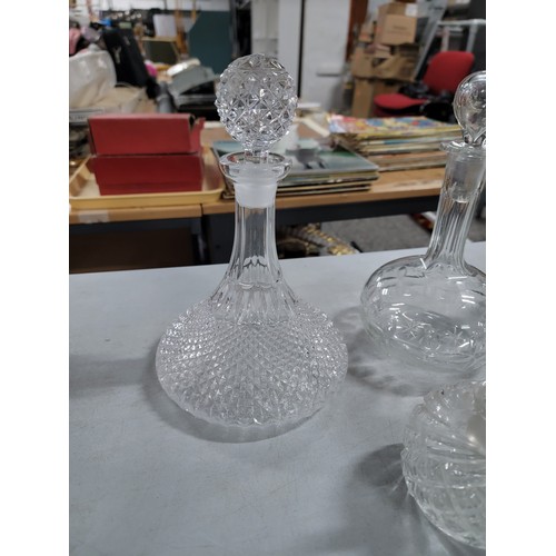 307 - 6x decanters inc ship's decanter cut glass crystal decanters along with 2x scent bottles