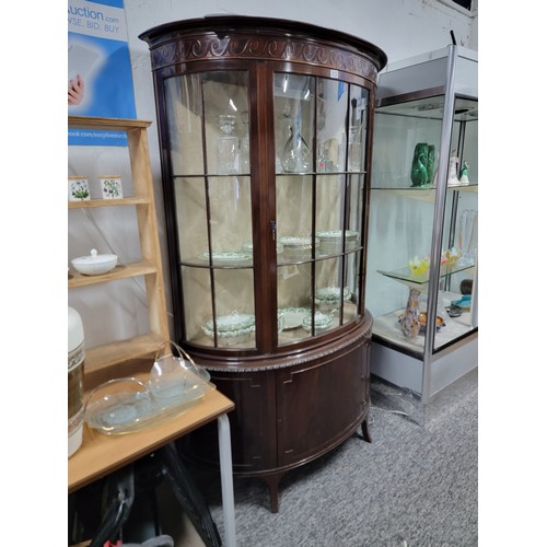 312 - Good quality mahogany bow fronted glazed display cabinet, illuminated, swirl carving top, 3 shelves ... 