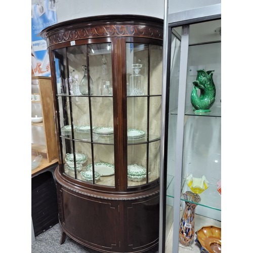 312 - Good quality mahogany bow fronted glazed display cabinet, illuminated, swirl carving top, 3 shelves ... 