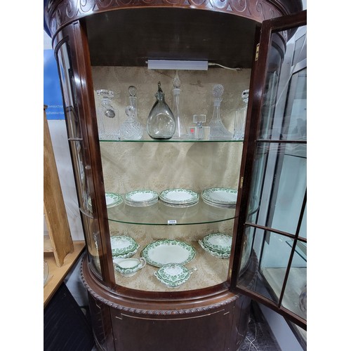 312 - Good quality mahogany bow fronted glazed display cabinet, illuminated, swirl carving top, 3 shelves ... 