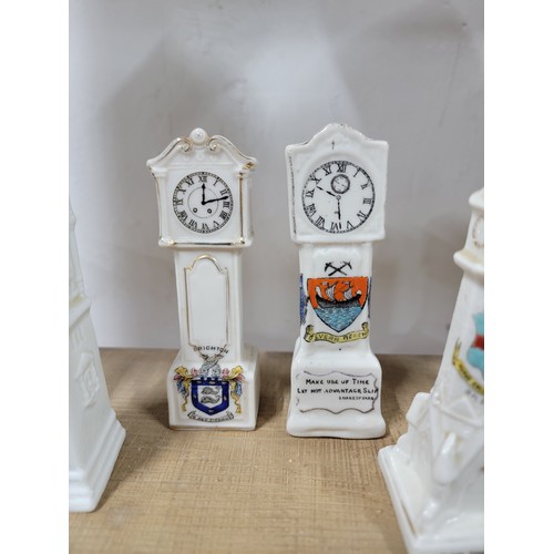 314 - 11x Crestware ornaments of clocks and grandfather clocks from various locations inc Birmingham, Sout... 