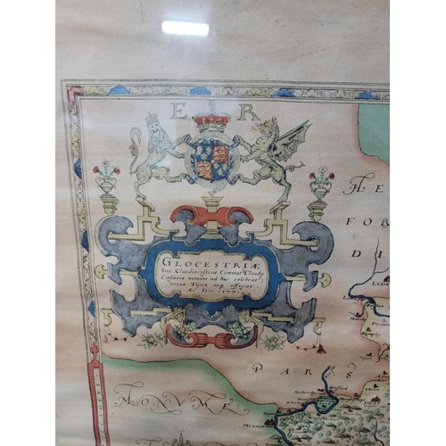 318 - A good oak framed and glazed vintage reproduction Saxton's map of Gloucestershire 1577.