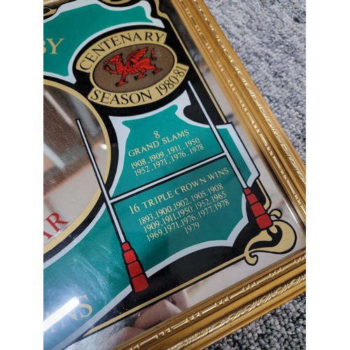 328 - Framed mirror depicting 100 years of welsh rugby dating 1980-81, 8x grand slams and 16 triple crown ... 