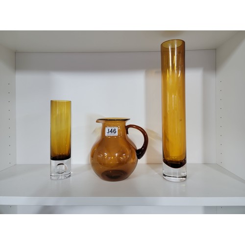 346 - 3x amber glass coloured pieces of glassware inc a large glass pitcher jug and 2x tall tube like vase... 