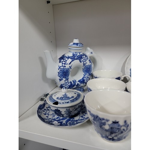 349 - Large collection of approx 60 pieces of blue and white pottery inc cups, saucers, side plates, platt... 