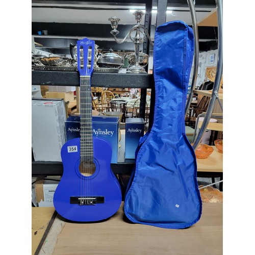 354 - Music Alley Blue acoustic guitar model MA-52 along with carry bag.