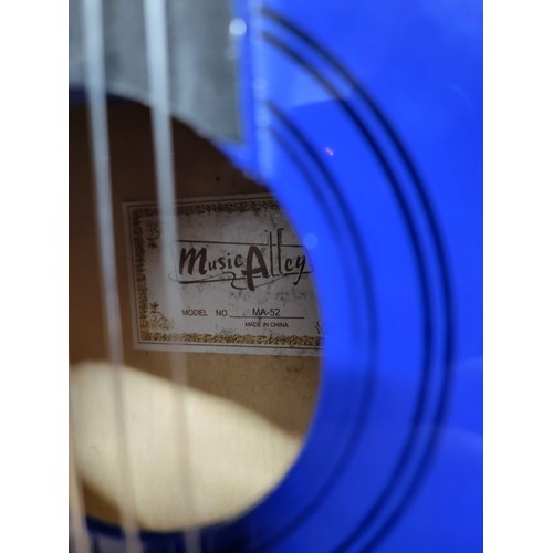 354 - Music Alley Blue acoustic guitar model MA-52 along with carry bag.