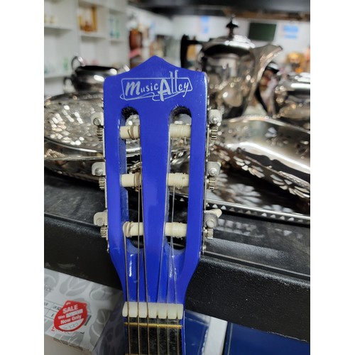 354 - Music Alley Blue acoustic guitar model MA-52 along with carry bag.