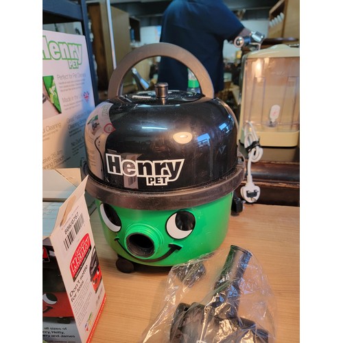 422 - Boxed as new Henry pet by Numatic vacuum cleaner along with accessories in good condition opened for... 