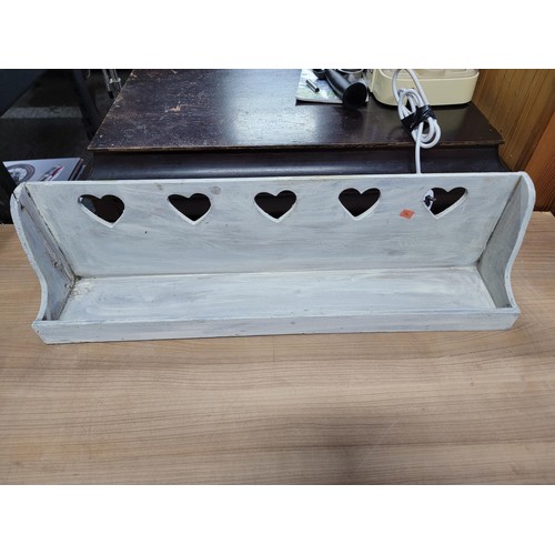 426 - Wooden fair trade duck on a log with egg decoration along with a heart decorated shelf