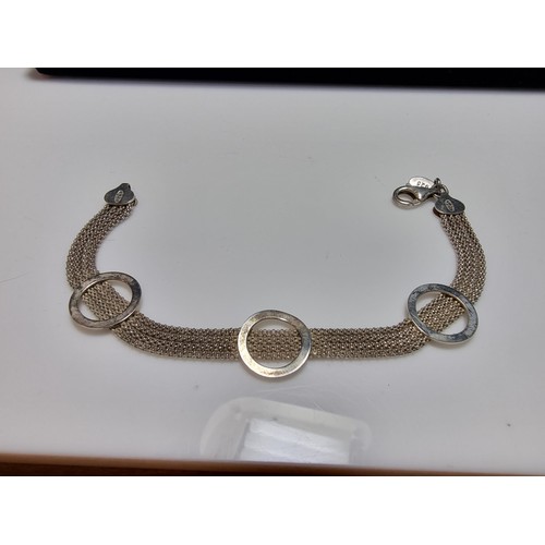 189 - A 925 silver Italy 4 strand bracelet by Laura Ashley, in excellent clean condition, boxed, length of... 