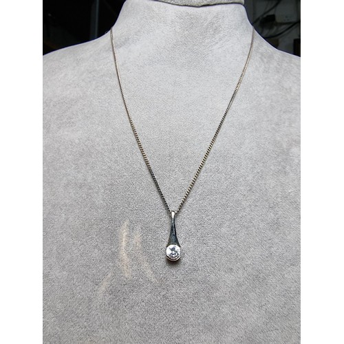 191 - A 925 silver pendant inset with a sparkly CZ stone on an 18