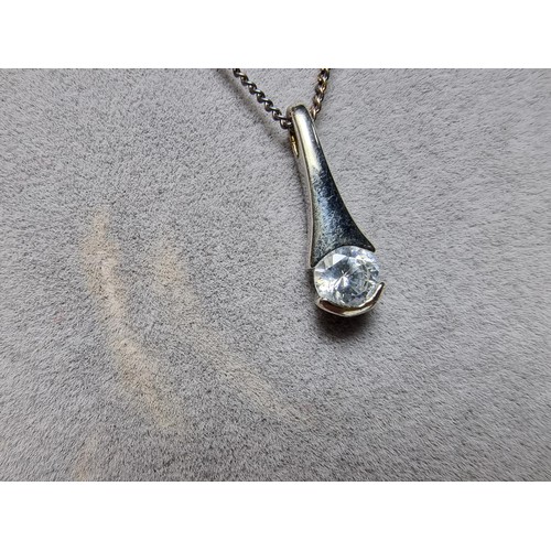 191 - A 925 silver pendant inset with a sparkly CZ stone on an 18